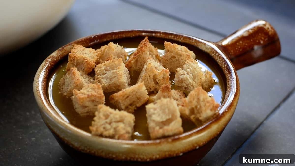 topping with toasted bread cubes