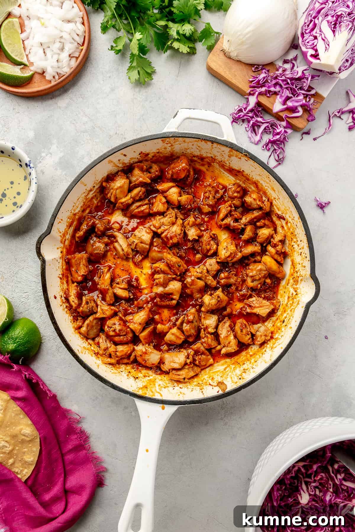 Sticky Chipotle Chicken Tacos with Smoky Lime Slaw 8 Saucy Chipotle Chicken in skillet.