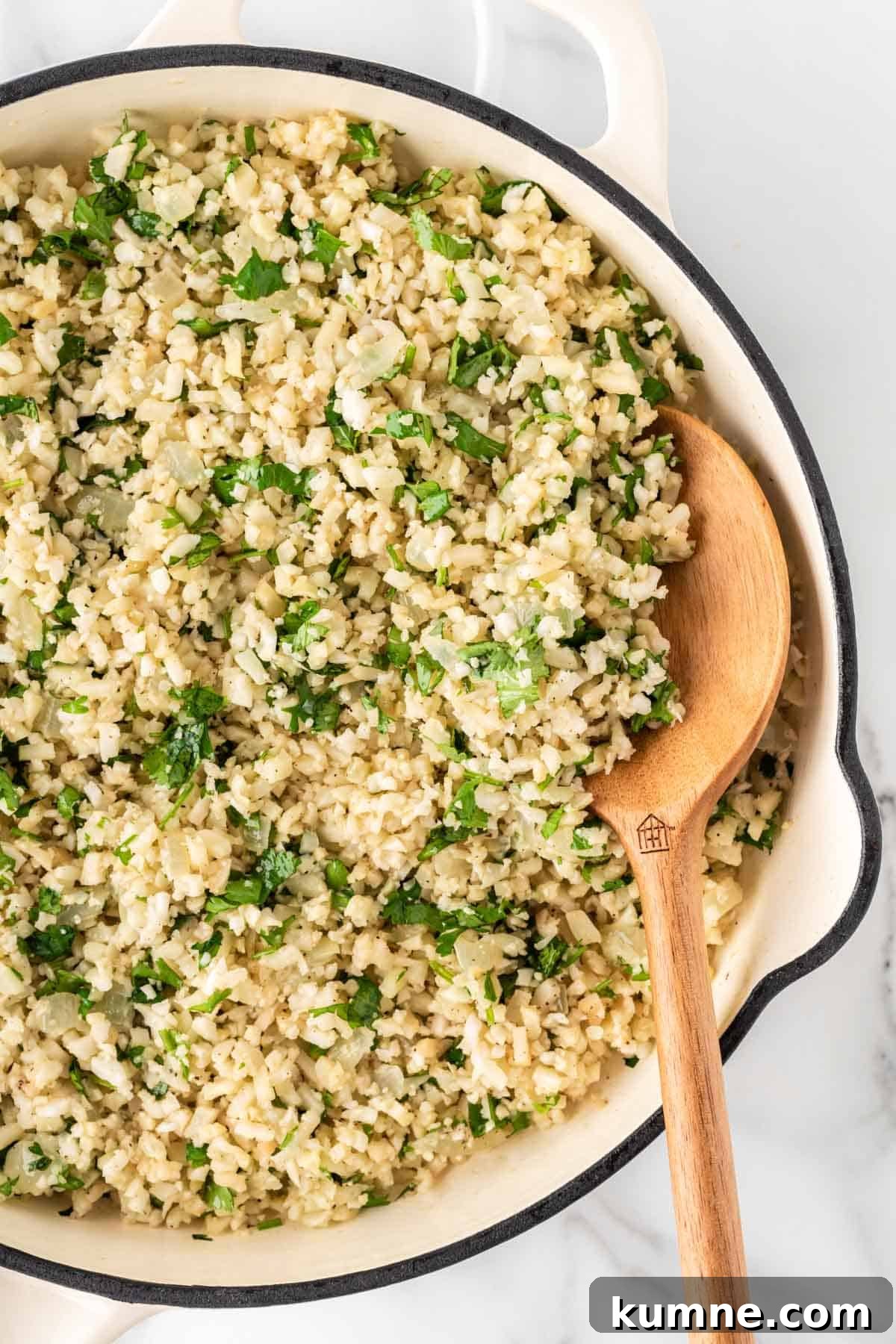 Cilantro Lime Cauliflower Rice Recipe — Zesty Low-Carb Side 12 stirring the cauliflower rice