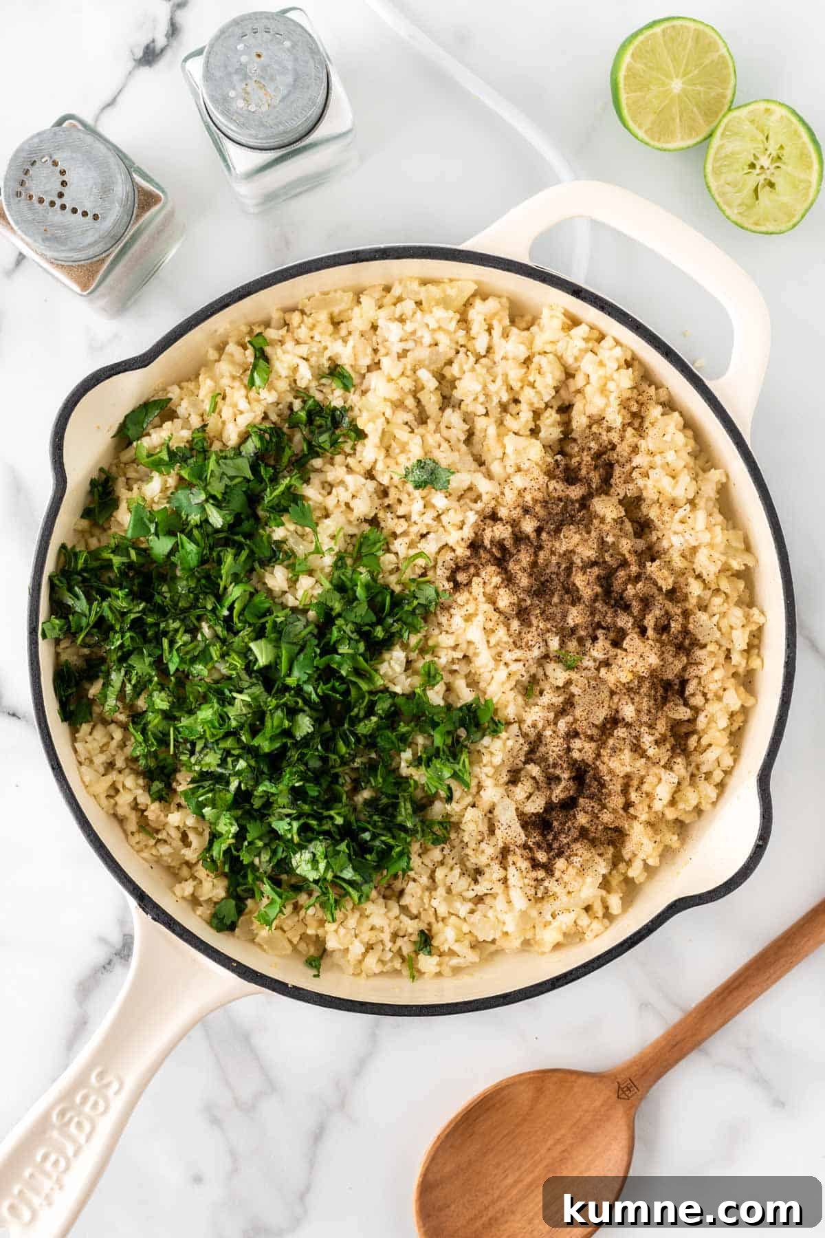 Cilantro Lime Cauliflower Rice Recipe — Zesty Low-Carb Side 9 adding the cilantro, lime, and spices to the cauliflower rice