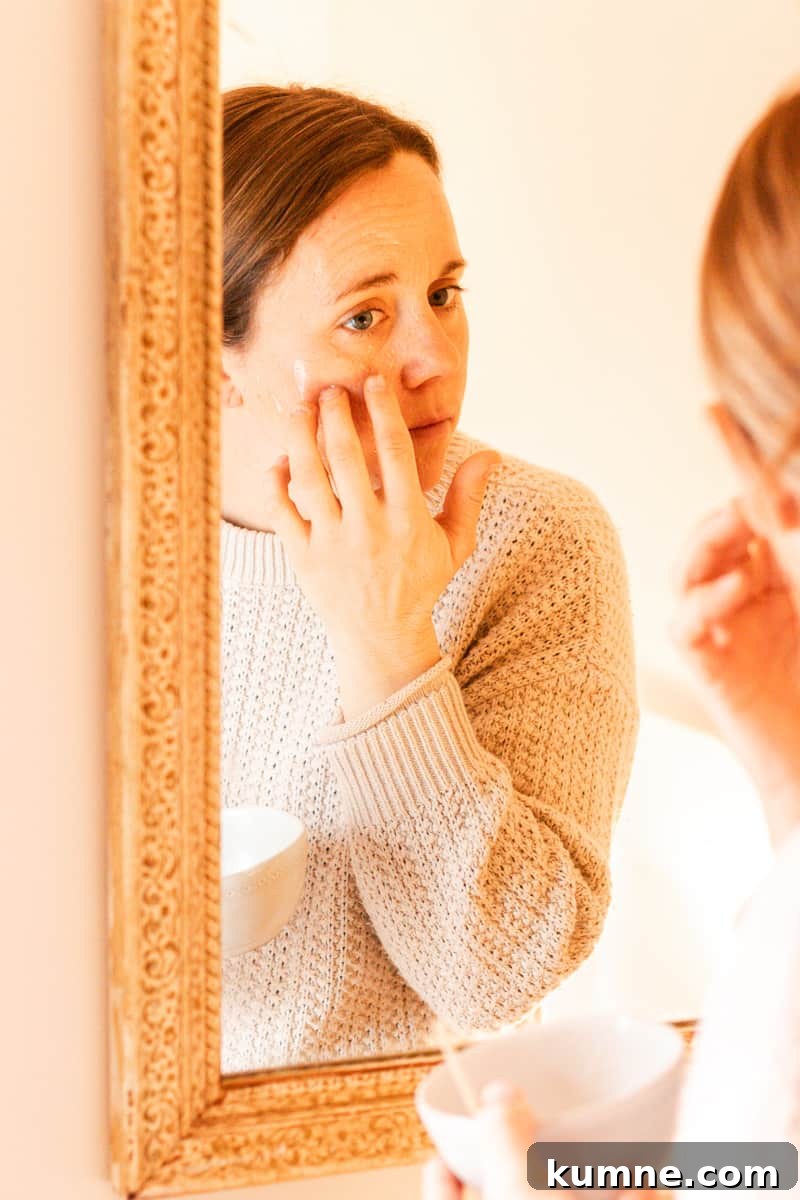 Baking Soda Face Mask: How to Make and Use It Safely 8 Wiping on the baking soda face mask with my fingers.