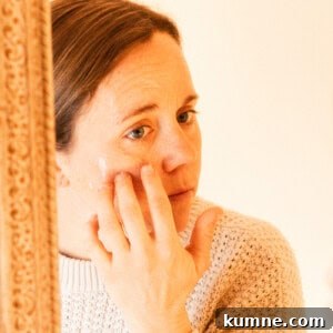 Baking Soda Face Mask: How to Make and Use It Safely 9 Applying the face mask to my cheek bones.