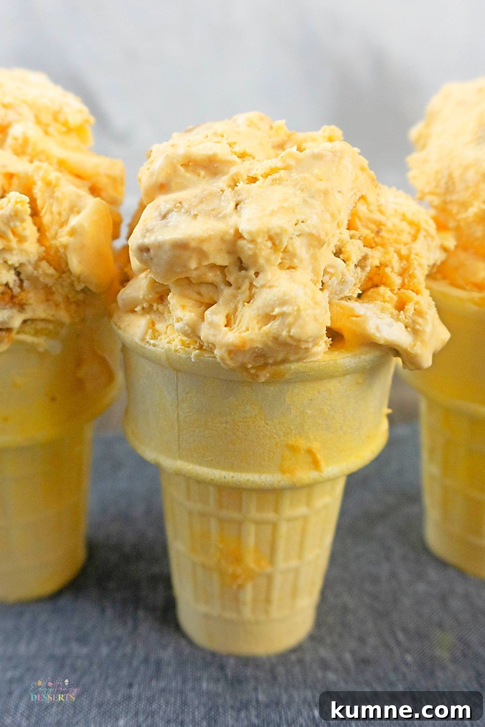 No-Churn Pumpkin Ice Cream with Gingersnap Cookies 3 Close up image of homemade pumpkin ice cream in ice cream cones