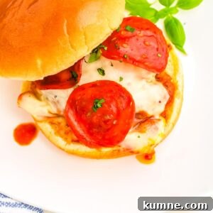 Pizza Burger Recipe: Juicy Cheeseburger with Pizza Flavor 8 The finished pizza burgers on a white plate.
