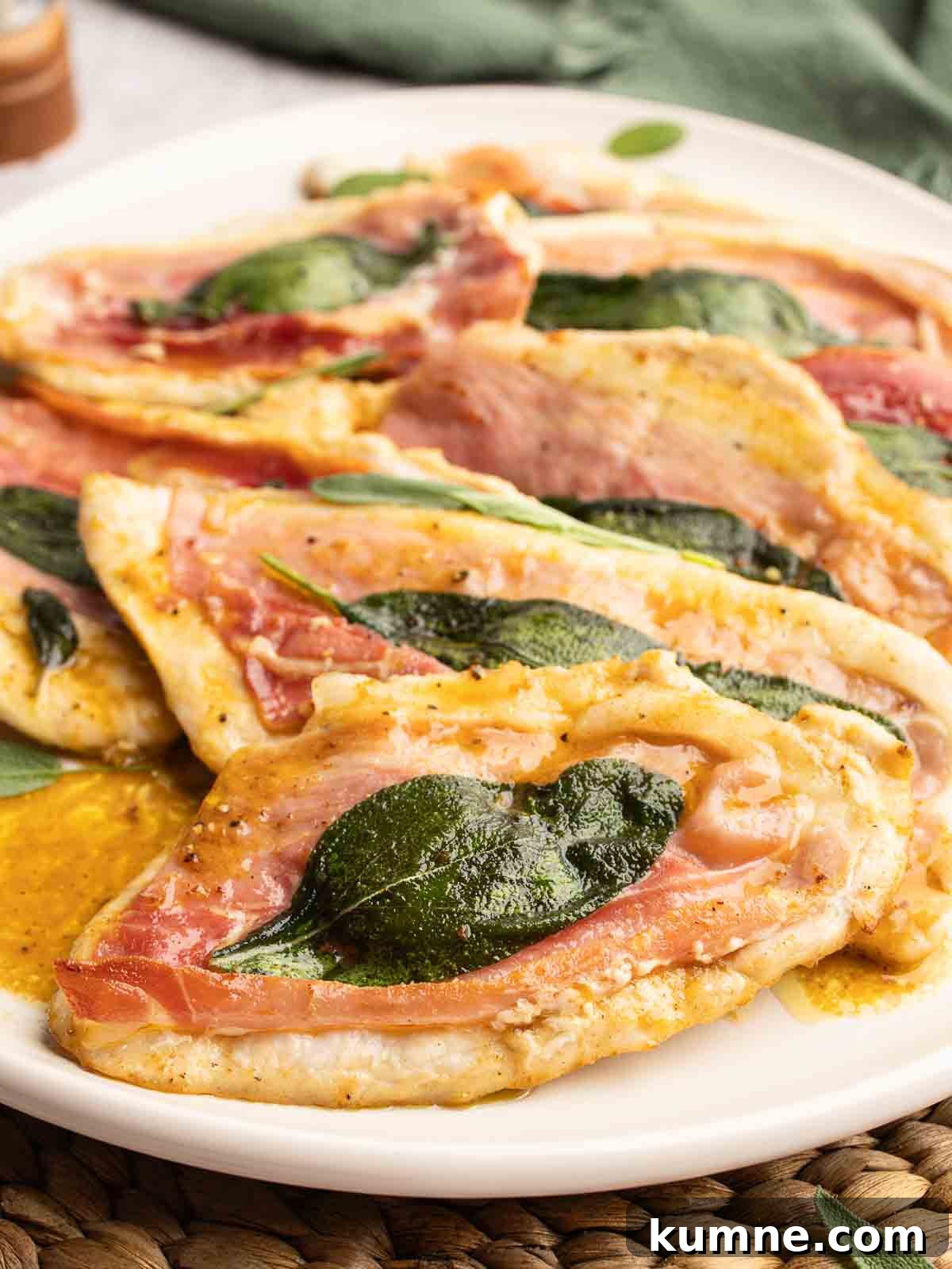 Chicken Saltimbocca arranged on a serving platter.