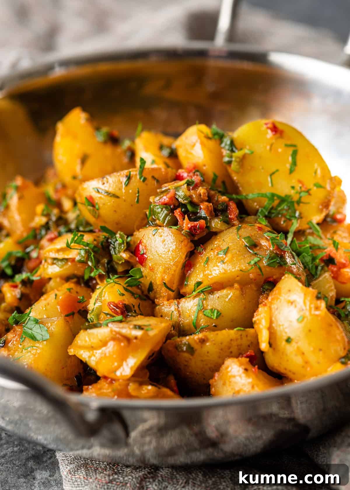 Spicy Calabrian Roasted Potatoes Recipe 7 closeup: calabrian potatoes topped with chili and herb butter