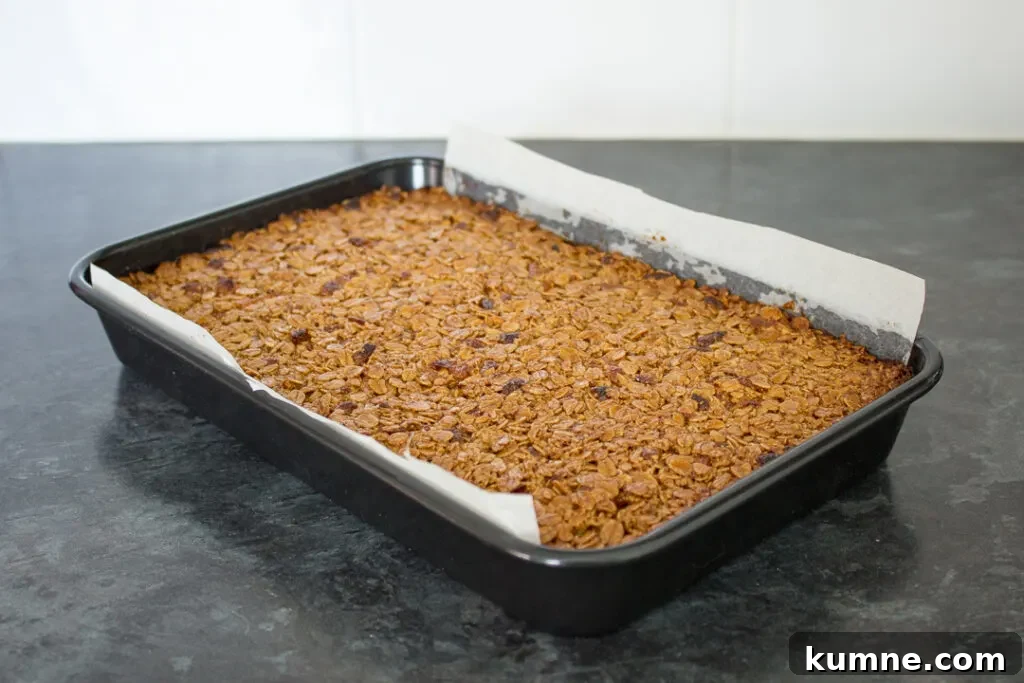 Chewy Apricot and White Chocolate Flapjack Recipe for Snacktime 11 Baked apricot flapjack in a lined tin
