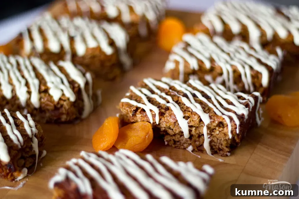 Chewy Apricot and White Chocolate Flapjack Recipe for Snacktime 12 White chocolate flapjacks on a chopping board with dried apricots