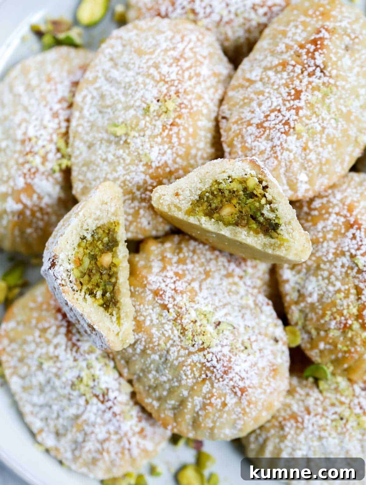 Photo showing the center cut of the pistachio maamoul cookie.