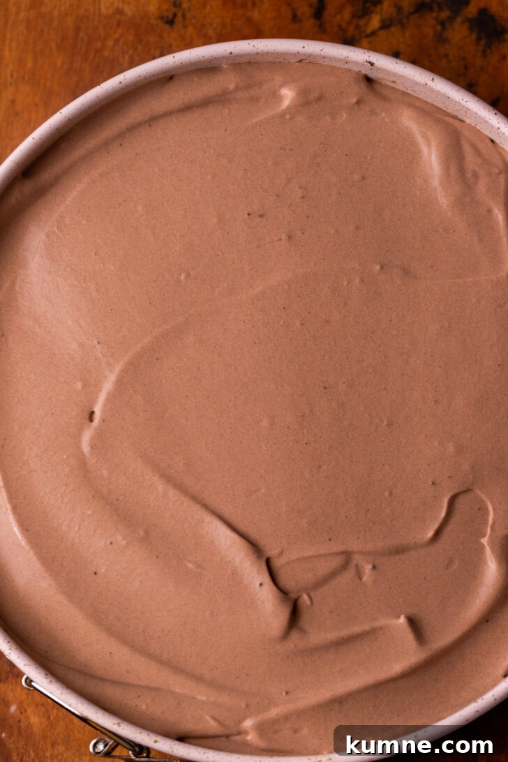 Decadent Mississippi Mud Pie Recipe — Classic Chocolate Dessert 7 Chocolate pudding in the pan.