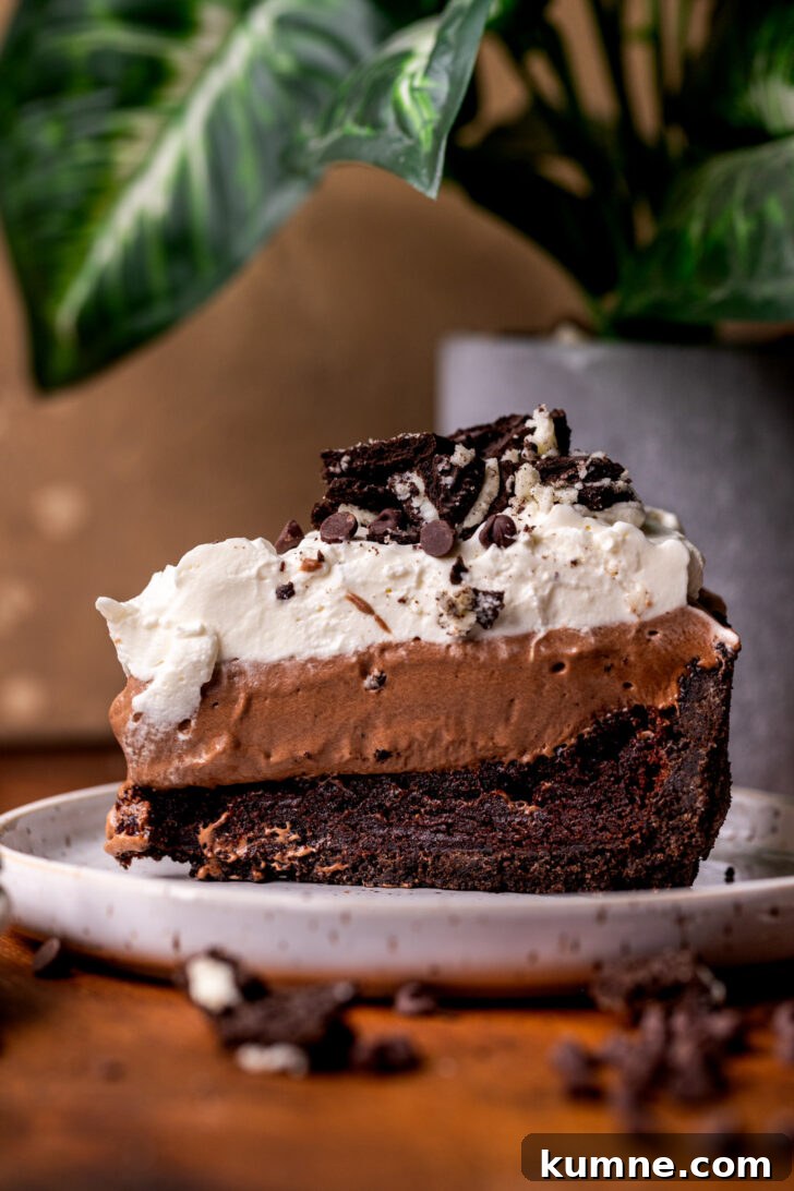 Decadent Mississippi Mud Pie Recipe — Classic Chocolate Dessert 10 Slice of pie on a plate.
