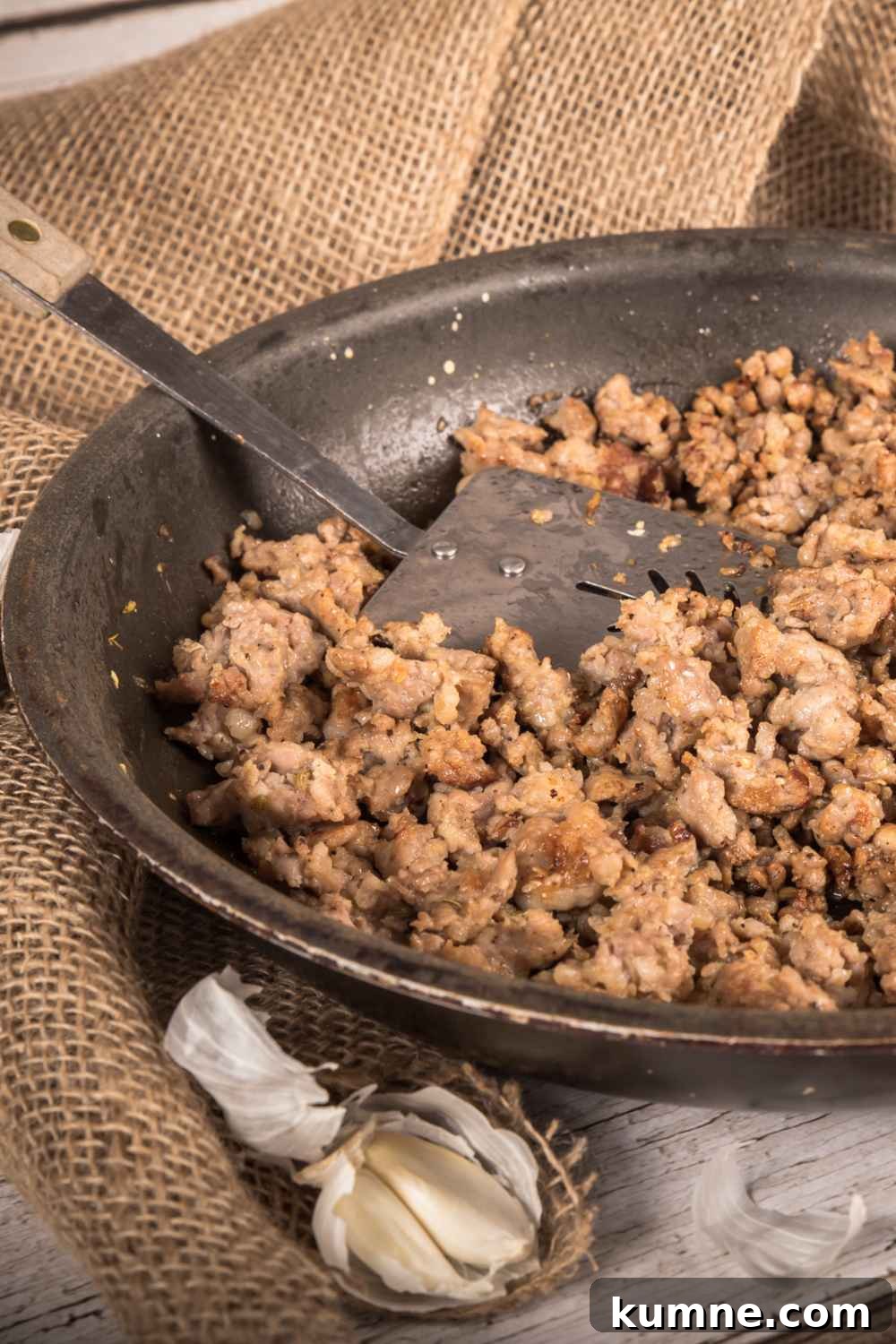 cooked ground pork in a pan for patty melts