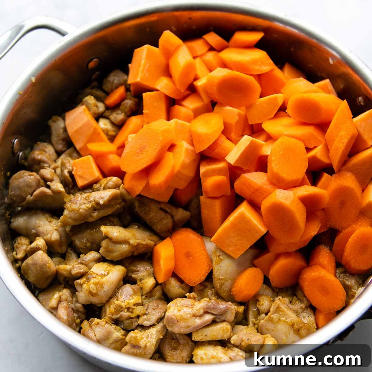 carrots and sweet potatoes cooked with chicken.