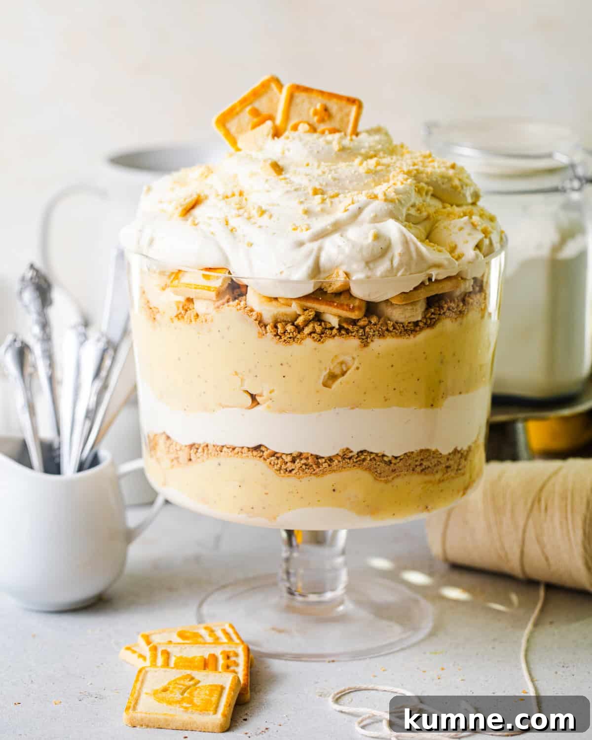 Homemade Banana Pudding Recipe: Classic from Scratch 2 banana pudding from scratch in a trifle bowl topped with chessman cookies and fresh bananas.