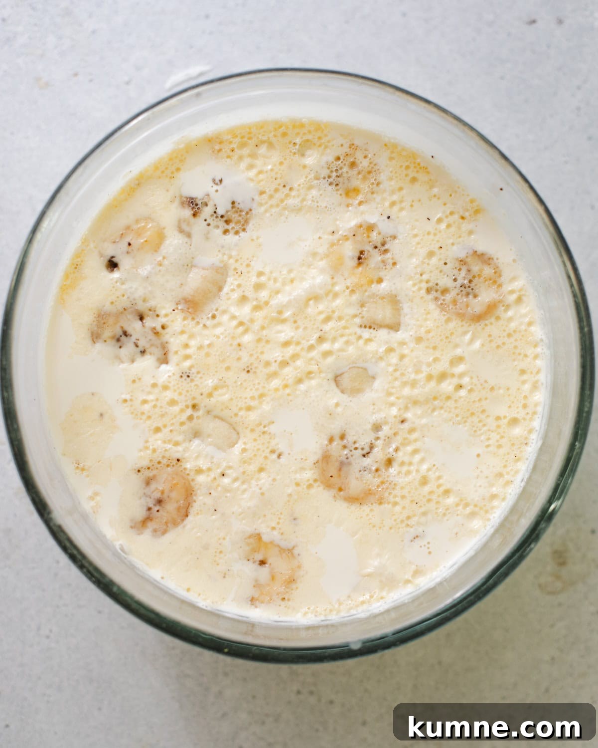 Homemade Banana Pudding Recipe: Classic from Scratch 4 sliced bananas in warm heavy cream and vanilla bean paste.
