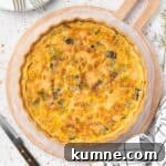 Smoked Salmon and Dill Quiche Recipe for Brunch 11 Salmon Quiche seen from above over a round wooden board and white baking paper sheets.