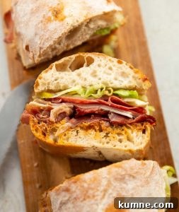 Ciabatta Sandwich close up shot of sliced ciabatta sandwich on chopping board