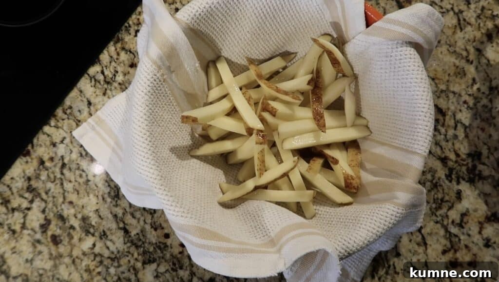 Potato sticks in a dish towel