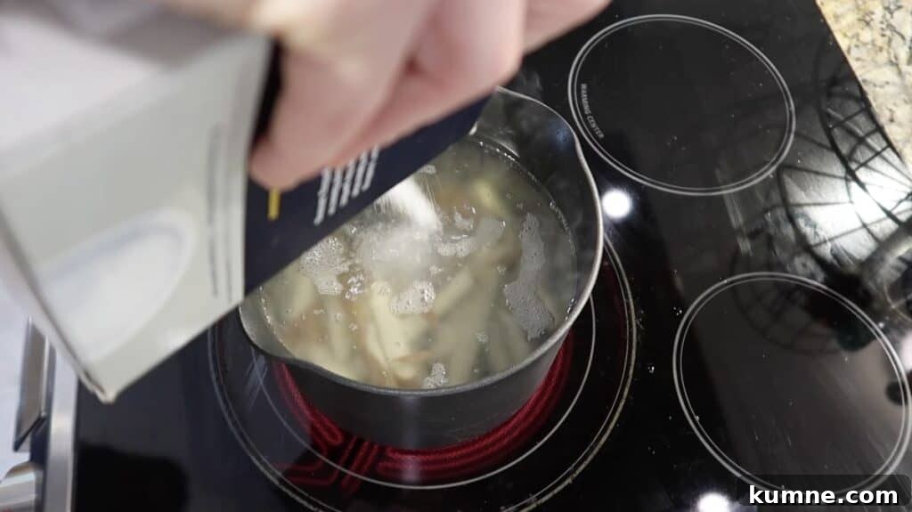 Adding salt to pot