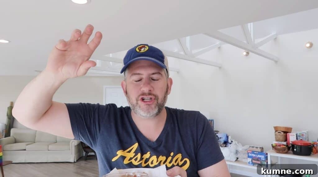 Man with eyes closed and hands raised - looking like he's praising them