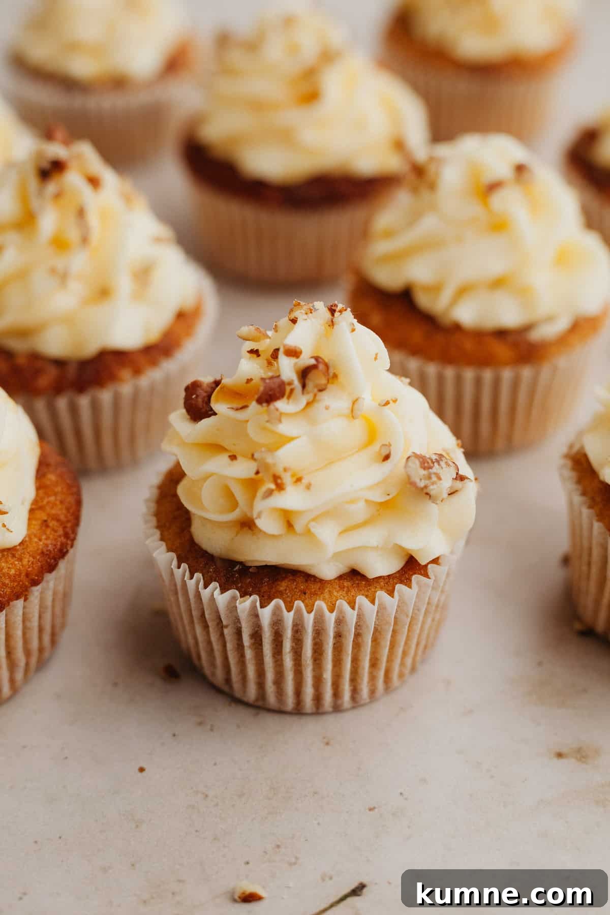 Maple Cupcakes Recipe with Brown Butter Frosting 10 Several maple cupcakes with frosting on top