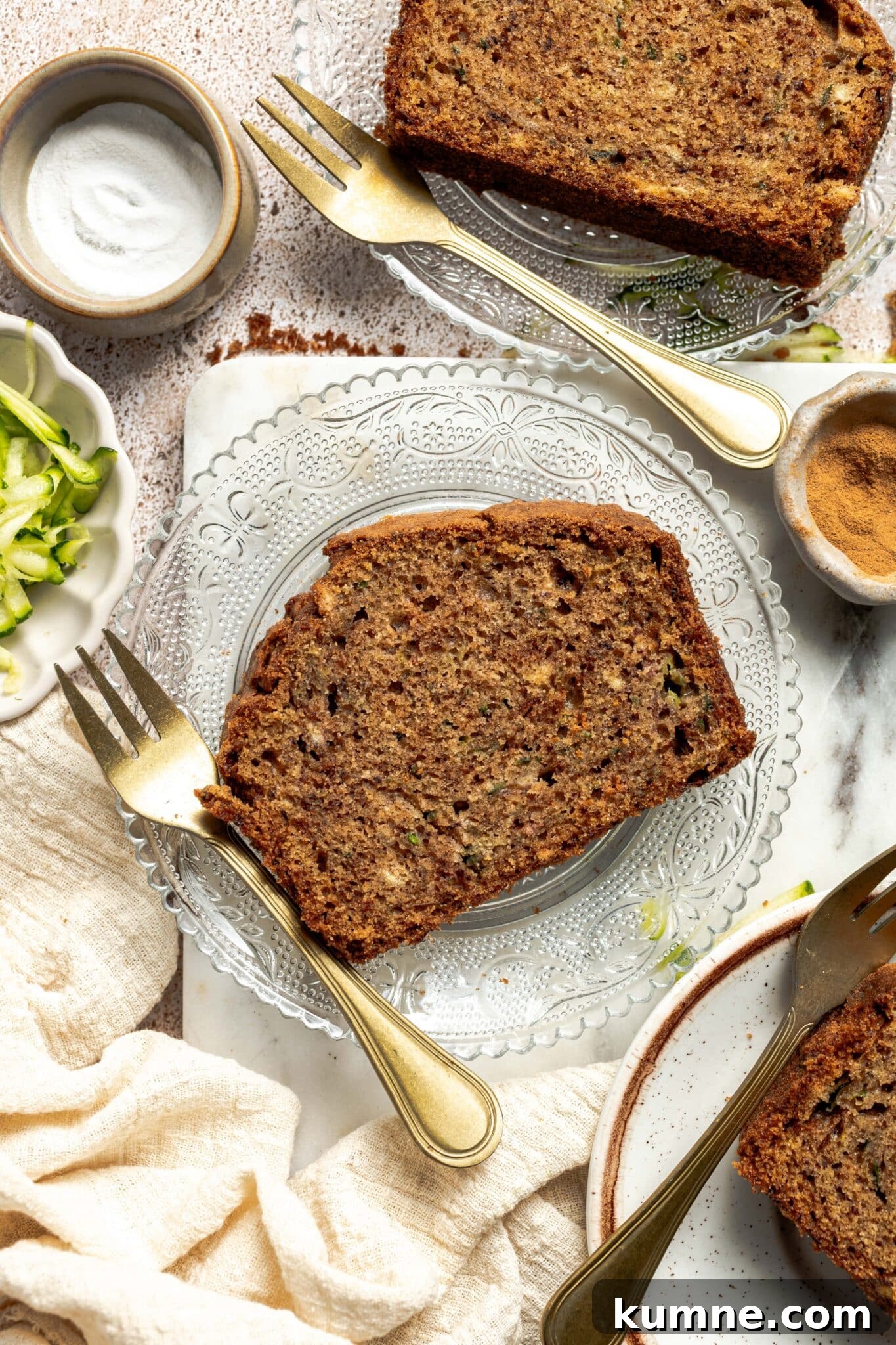 Moist Zucchini Bread Recipe with Cinnamon and Walnuts 2 slice of zucchini bread on a plate