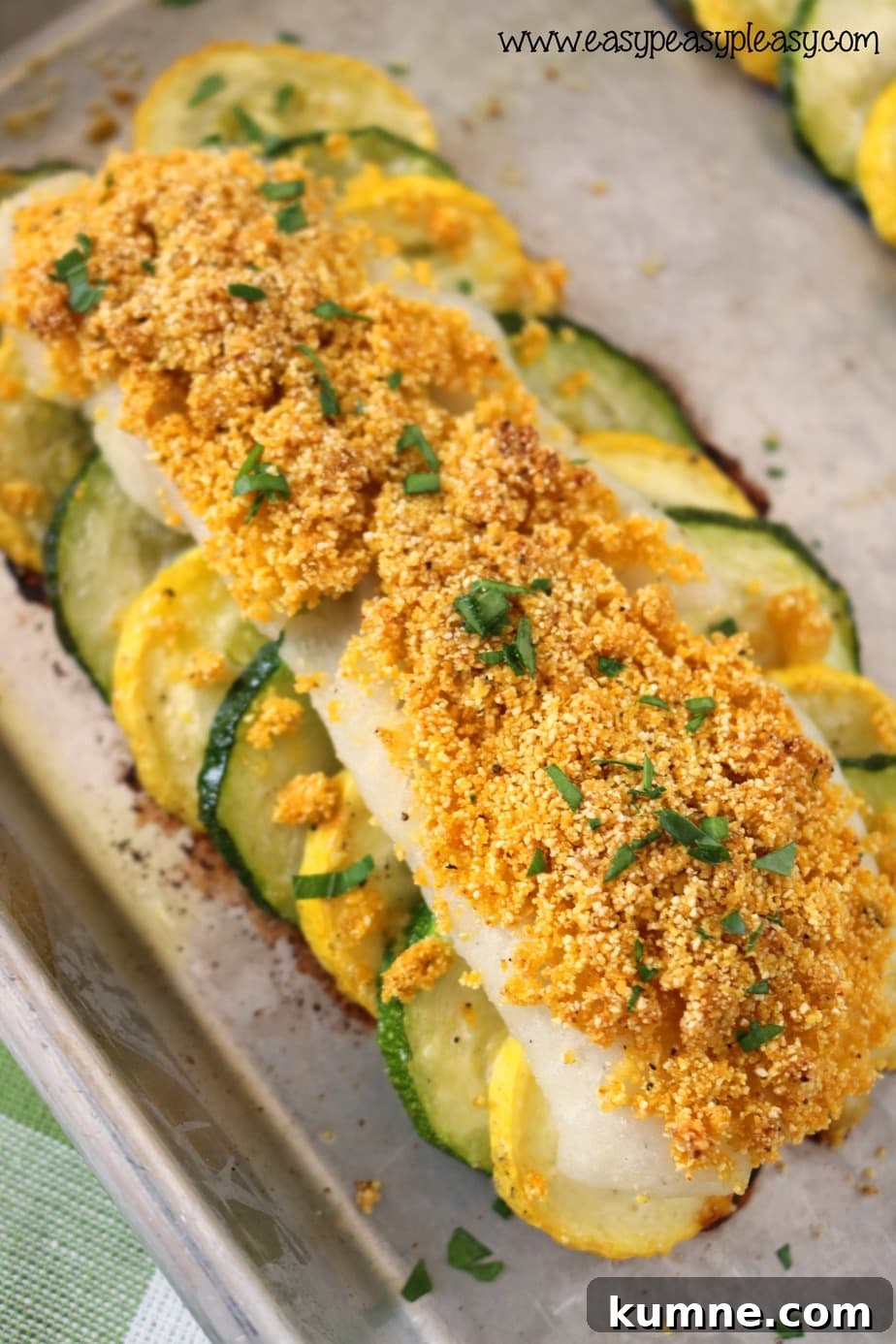 Crispy Parmesan-Crusted Crappie Recipe for Pan-Frying 2 Parmesan Breaded Crappie Recipe over Summer Vegetables is a delicious way to eat crappie.
