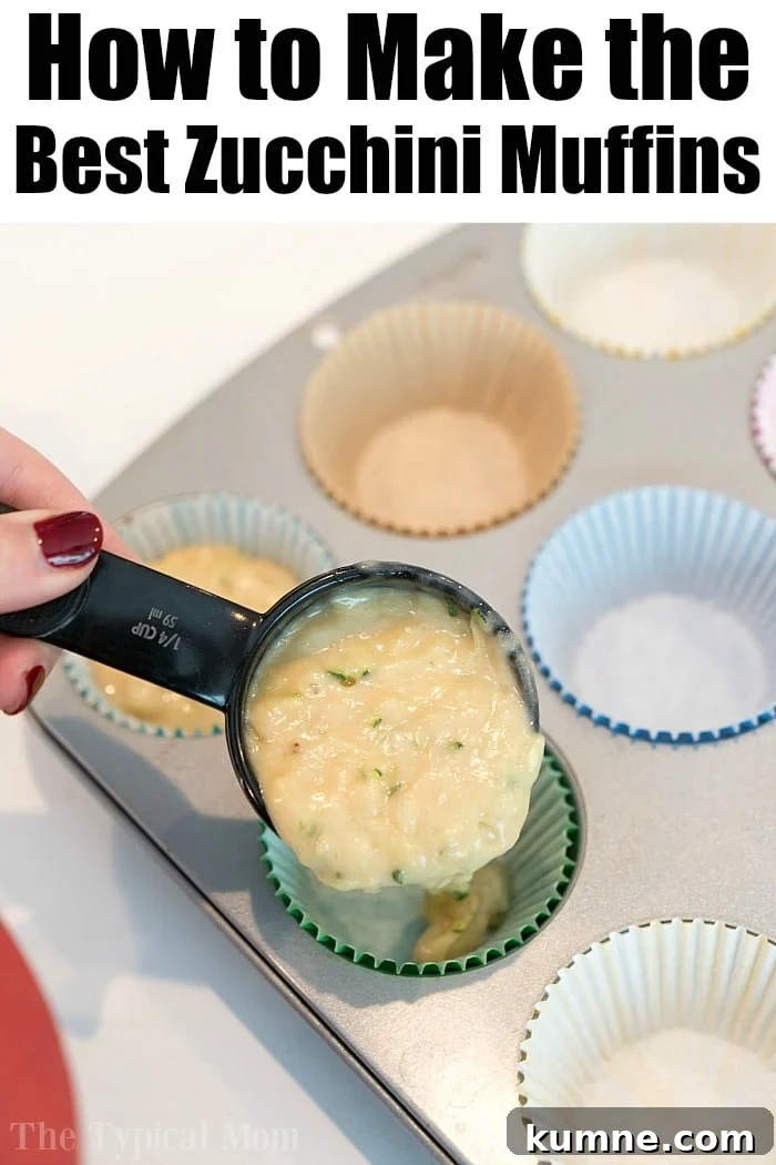 Ultimate Moist Zucchini Bread Recipe for Perfect Loaves Every Time 6 Scooping zucchini muffin batter into a lined muffin tin.