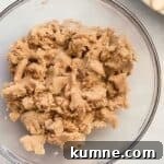 Authentic Dutch Apple Pie Recipe: Classic Ouderwets Appeltaart Guide 7 streusel topping mixed in a glass bowl.