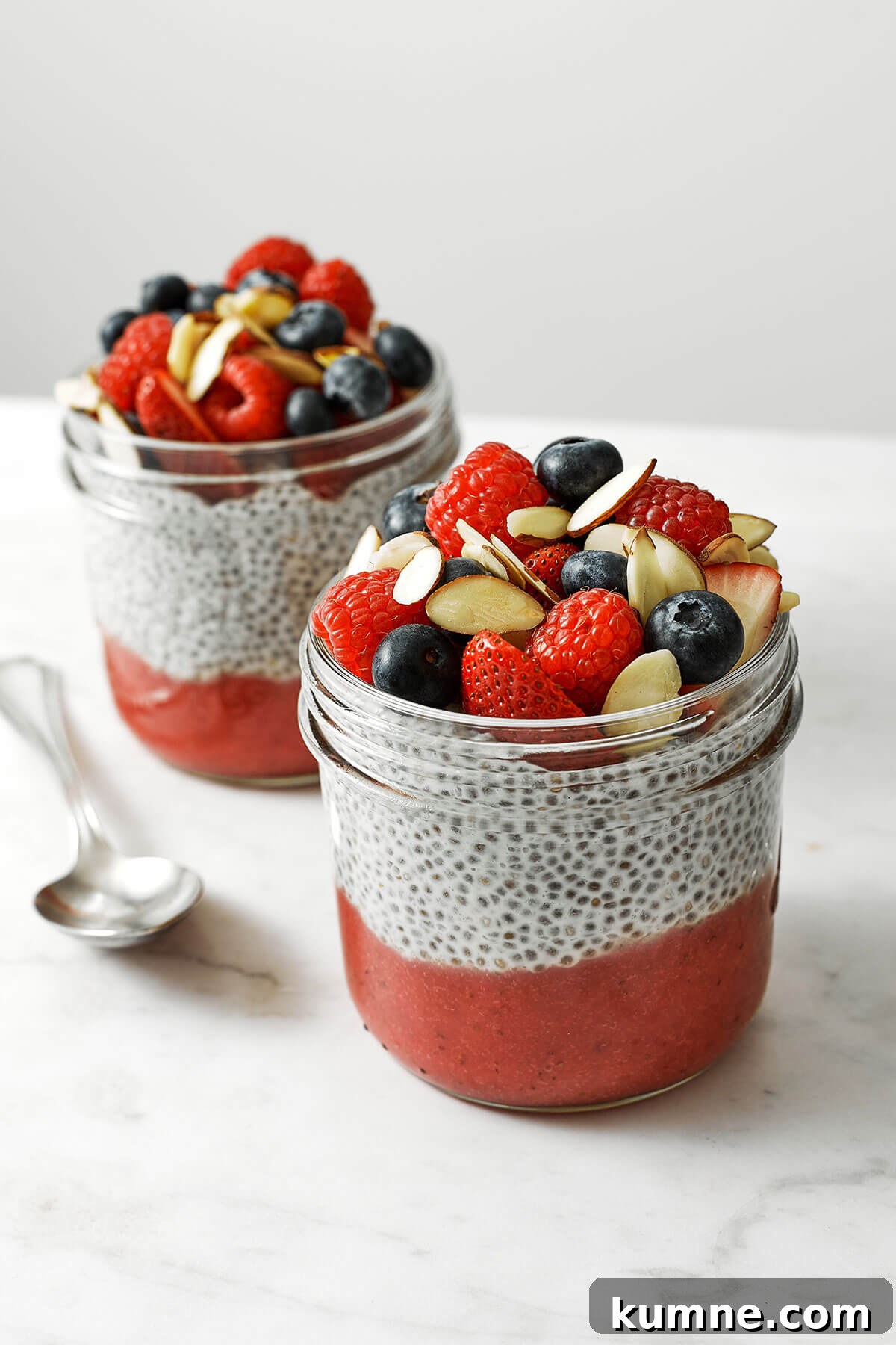 Two jars of chia pudding and fruits