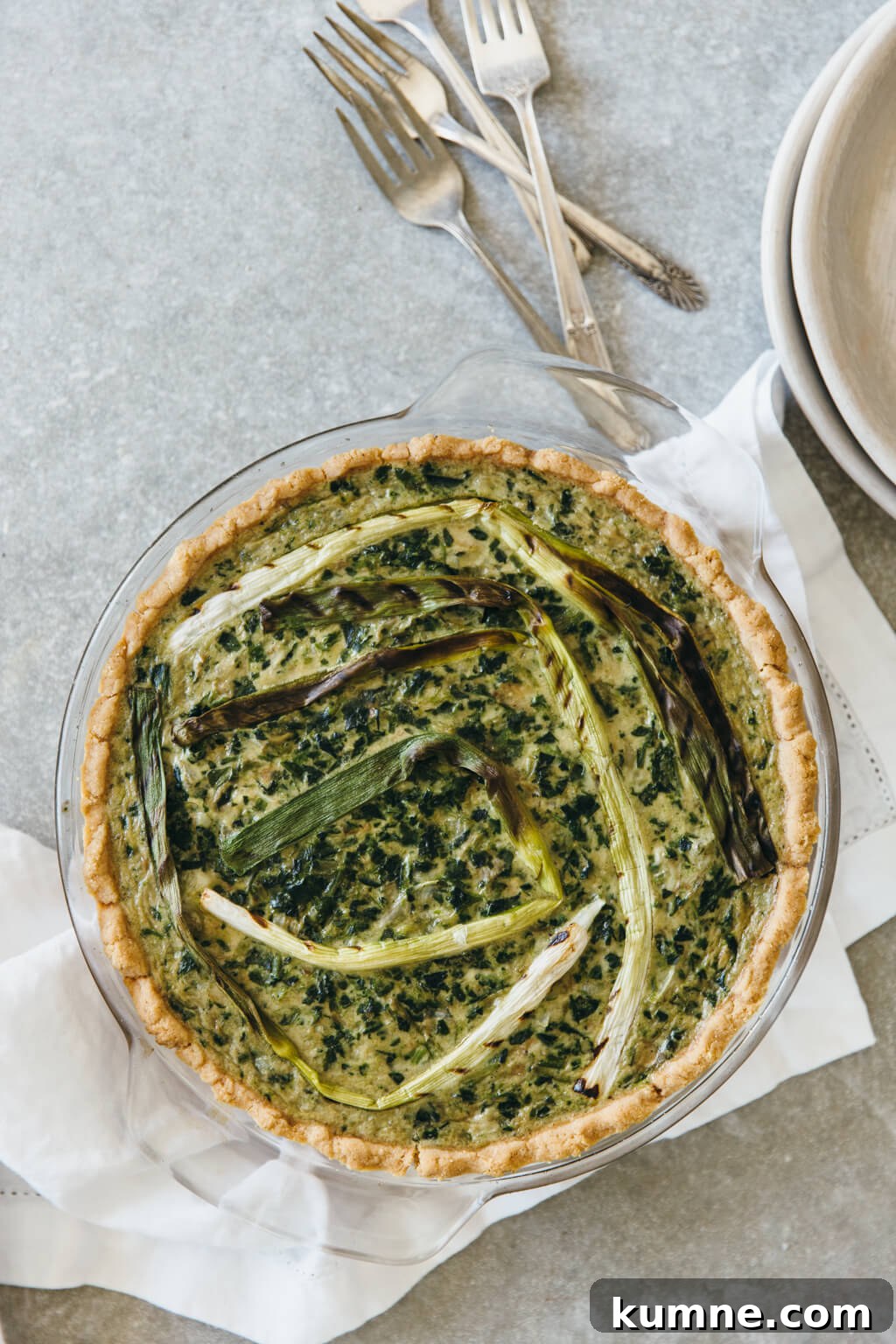 (gluten-free, paleo) Spinach artichoke quiche with grilled spring onions. The perfect healthy breakfast quiche!