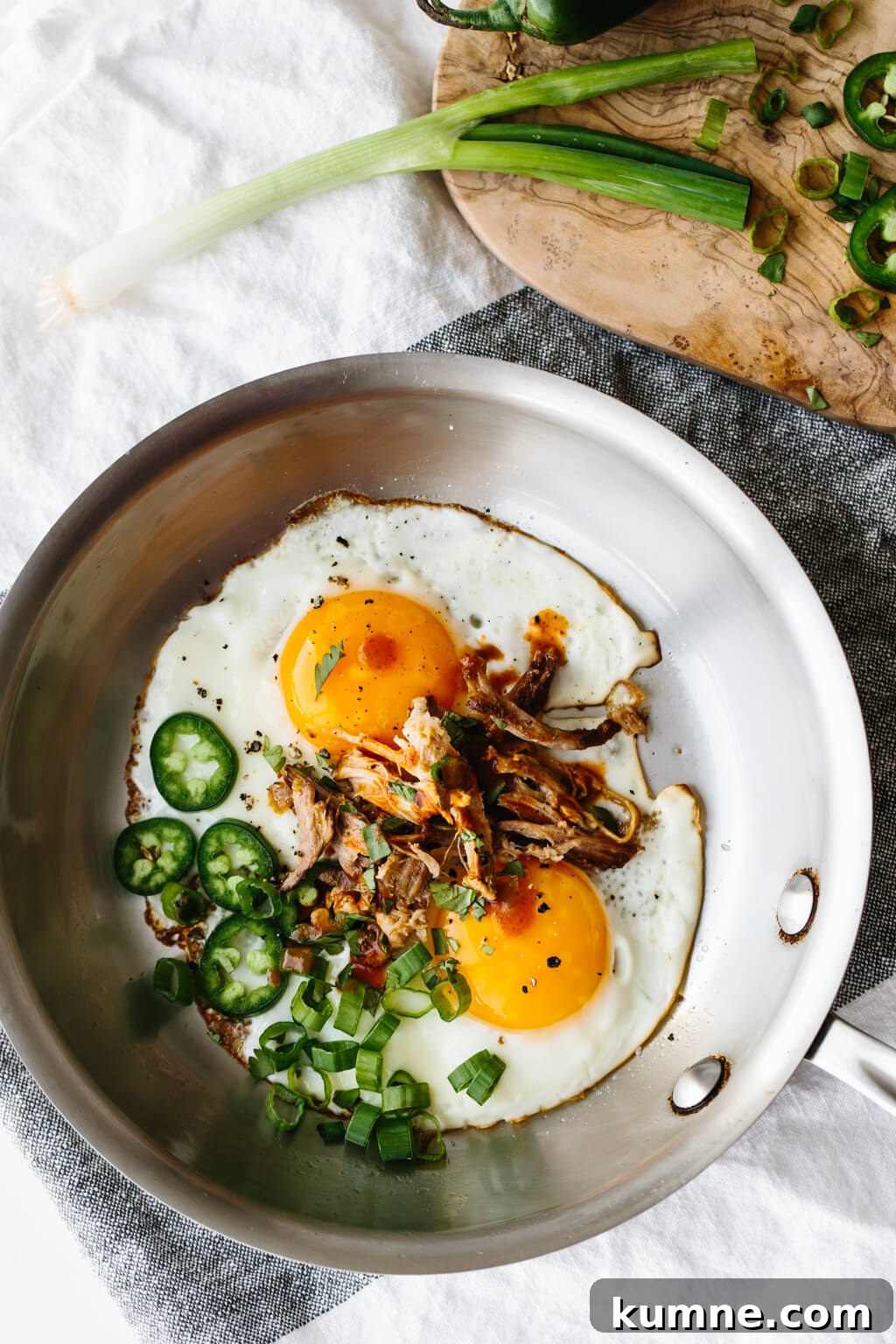 Spicy pulled pork fried eggs are a combination of hot sauce and jalapenos alongside runny eggs and flavorful pulled pork. It's a low-carb, keto, paleo, Whole30 breakfast recipe.