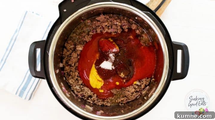 Instant Pot Sloppy Joes Recipe — Quick Comfort Dinner 5 Adding the remaining sloppy joes ingredients