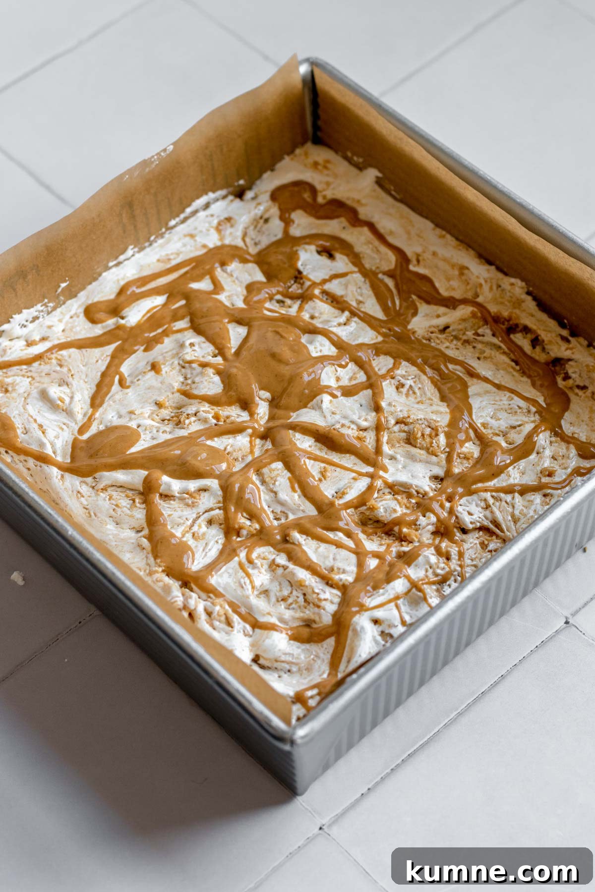 Peanut Butter Marshmallow Fluff Fudge (Fluffernutter) 12 Peanut butter drizzled on top of the fluff.