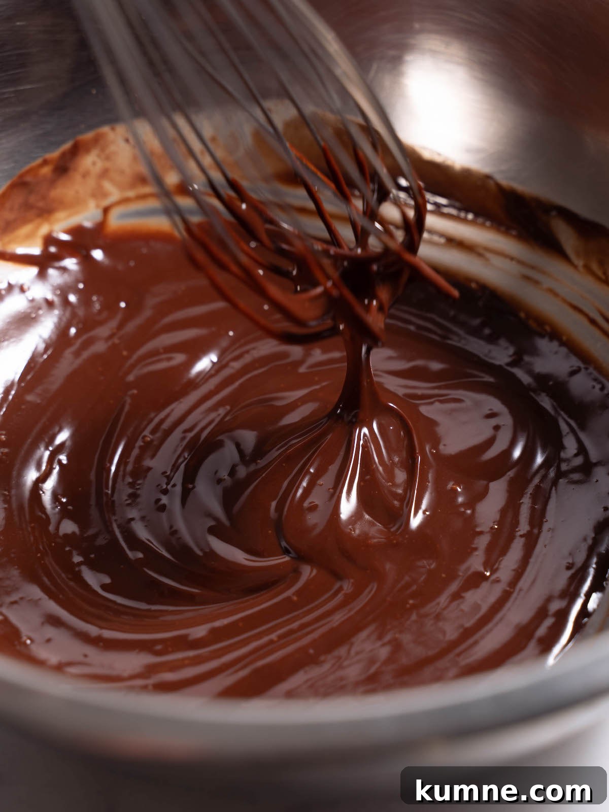 Up close silky texture of chocolate chili ganache