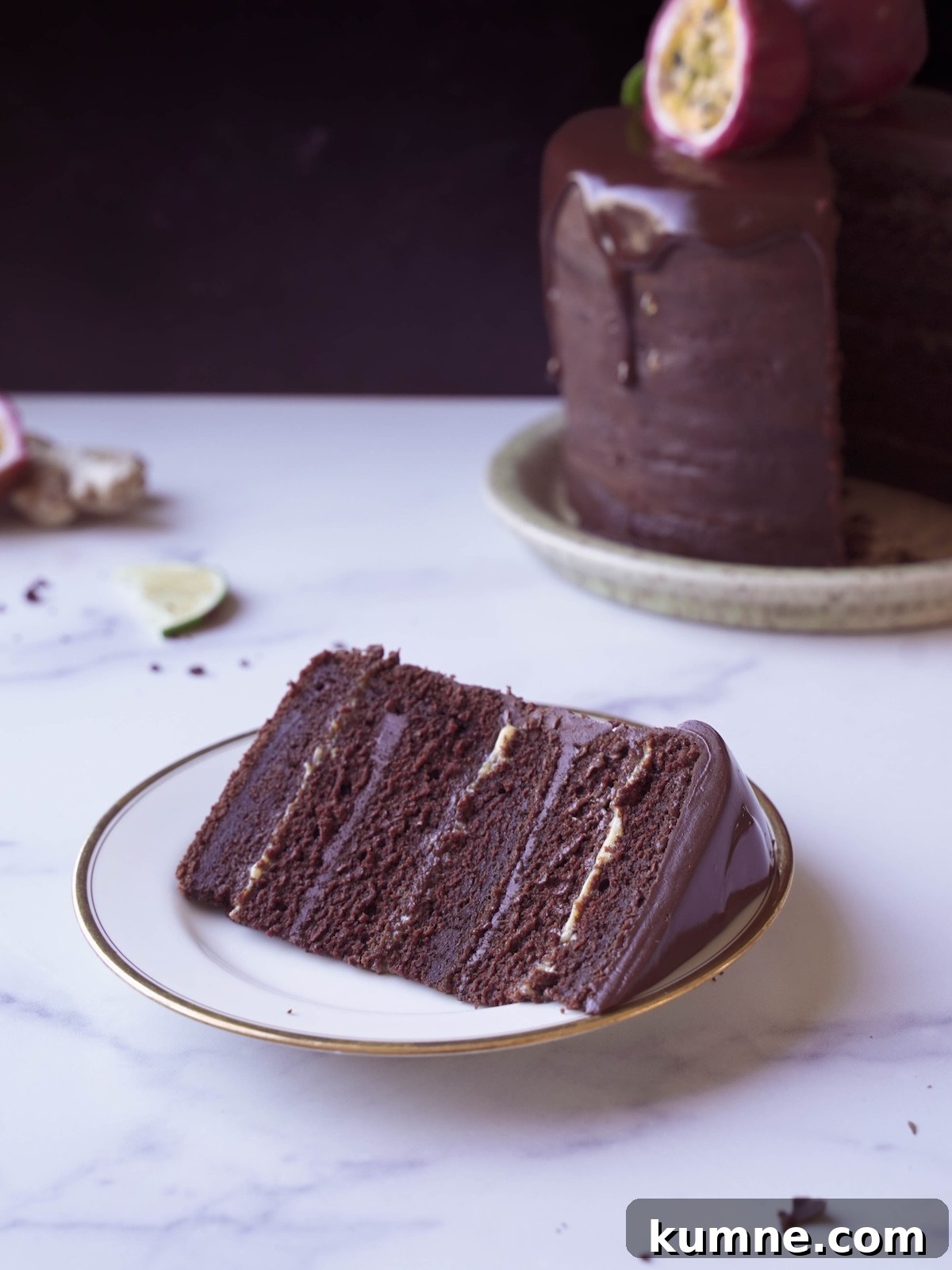 A slice of chocolate passionfruit cake on a plate