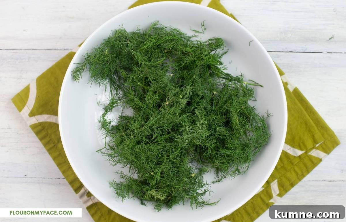 Dried herbs in a white bowl.