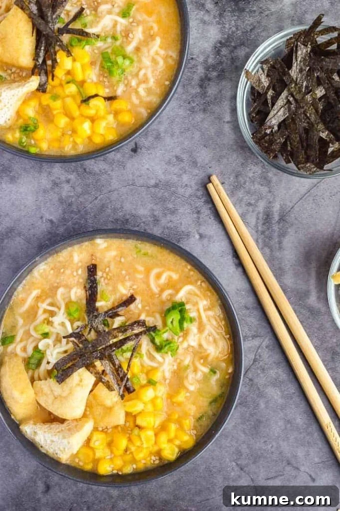 Quick 15-Minute Vegan Miso Ramen Recipe 5 Two bowls of ramen with chopsticks to the side