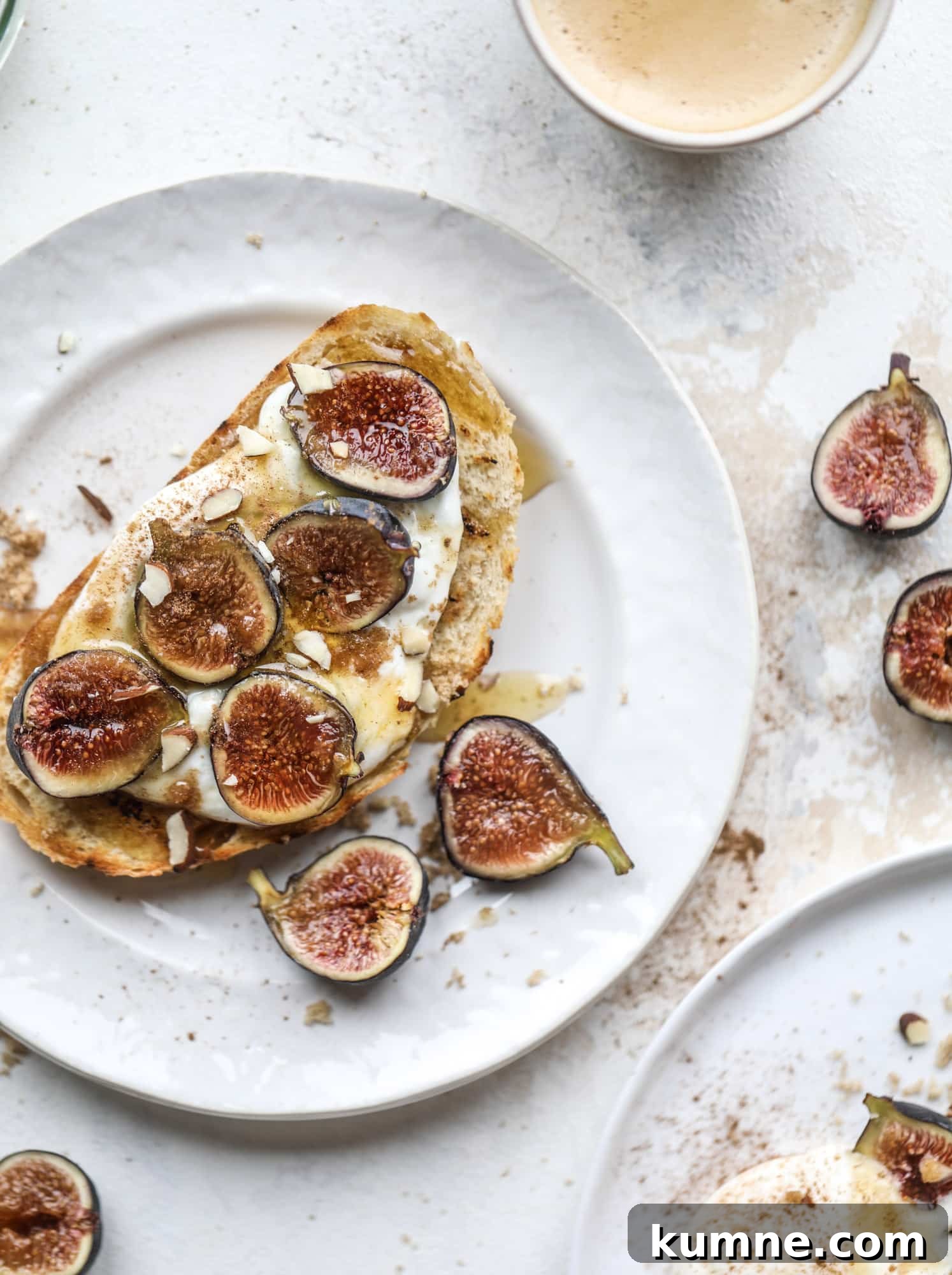 Grilled Cinnamon Toast with Fig & Ricotta Delight 2 This cinnamon sugar toast is an absolutely dream! It's spread with a cinnamon brown sugar butter, grilled to perfection and served with creamy whipped ricotta cheese, fresh figs, honey, cinnamon and sliced almonds. I howsweeteats.com #cinnamon #sugar #toast #ricotta #figs #breakfast