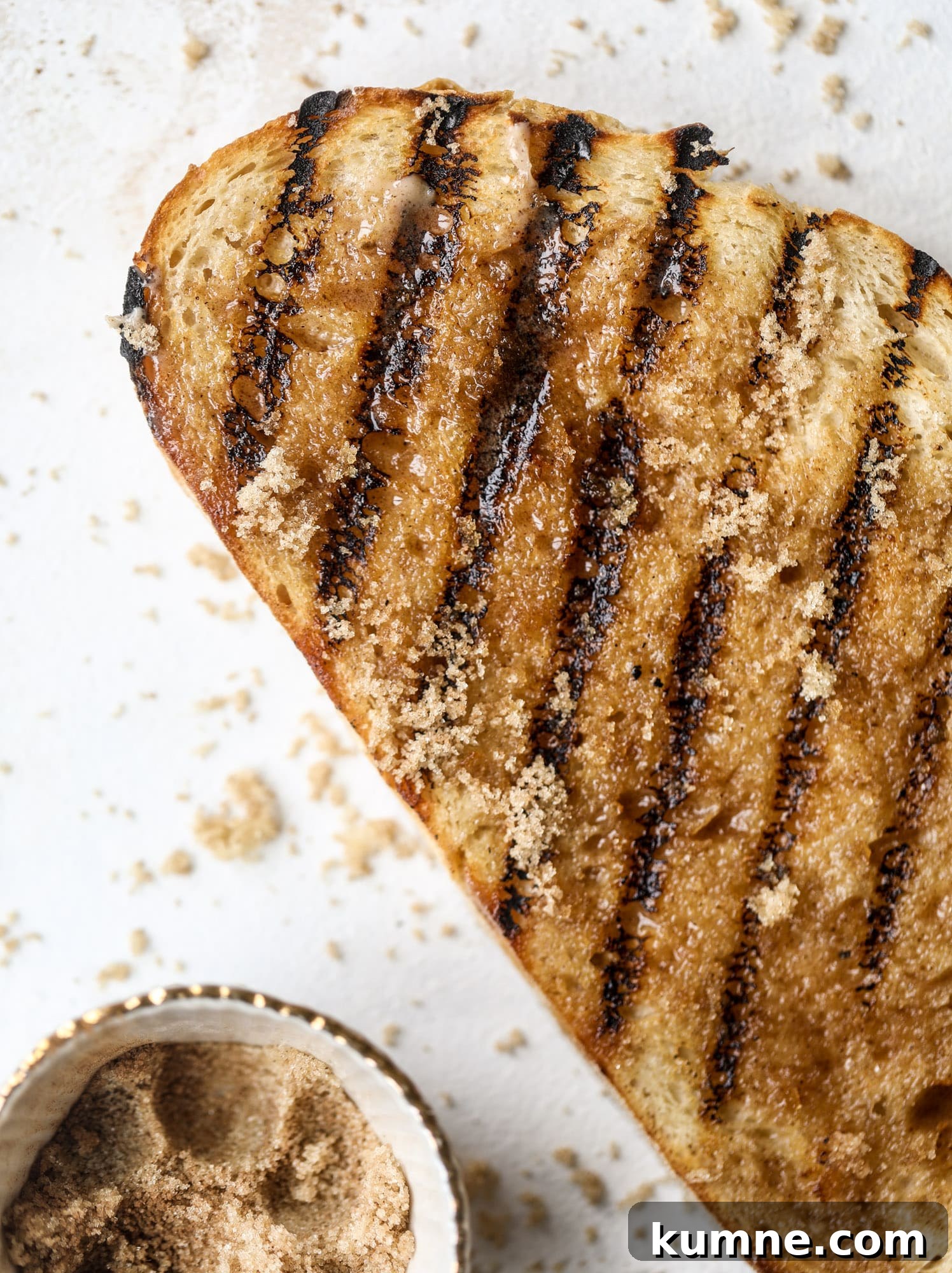 Grilled Cinnamon Toast with Fig & Ricotta Delight 5 This cinnamon sugar toast is an absolutely dream! It's spread with a cinnamon brown sugar butter, grilled to perfection and served with creamy whipped ricotta cheese, fresh figs, honey, cinnamon and sliced almonds. I howsweeteats.com #cinnamon #sugar #toast #ricotta #figs #breakfast