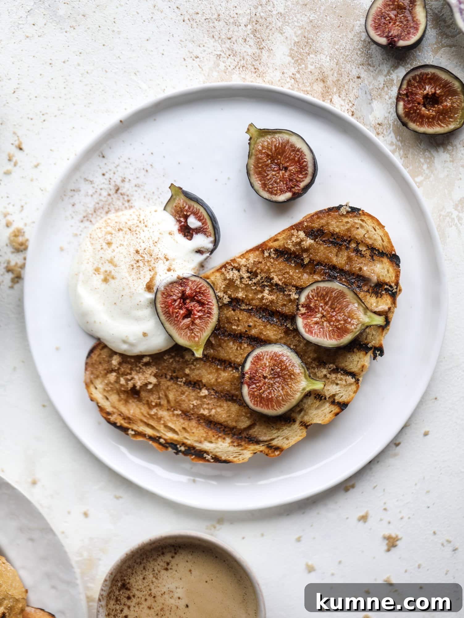 Grilled Cinnamon Toast with Fig & Ricotta Delight 6 This cinnamon sugar toast is an absolutely dream! It's spread with a cinnamon brown sugar butter, grilled to perfection and served with creamy whipped ricotta cheese, fresh figs, honey, cinnamon and sliced almonds. I howsweeteats.com #cinnamon #sugar #toast #ricotta #figs #breakfast