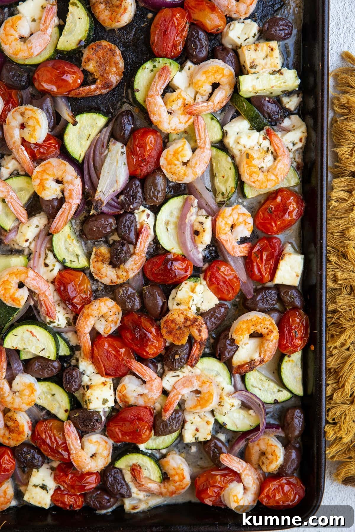 38-Day Balanced Meal Plan for Lasting Energy and Weight Control 8 Large baking sheet with shrimp and vegetables for a complete meal, fresh out of the oven.
