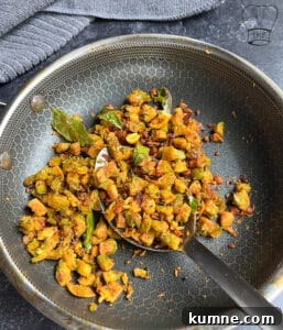 Crispy Bitter Gourd Stir-Fry (Pavakkai Poriyal) 3 Healthy bitter gourd stir fry with spices and herbs for a nutritious meal.