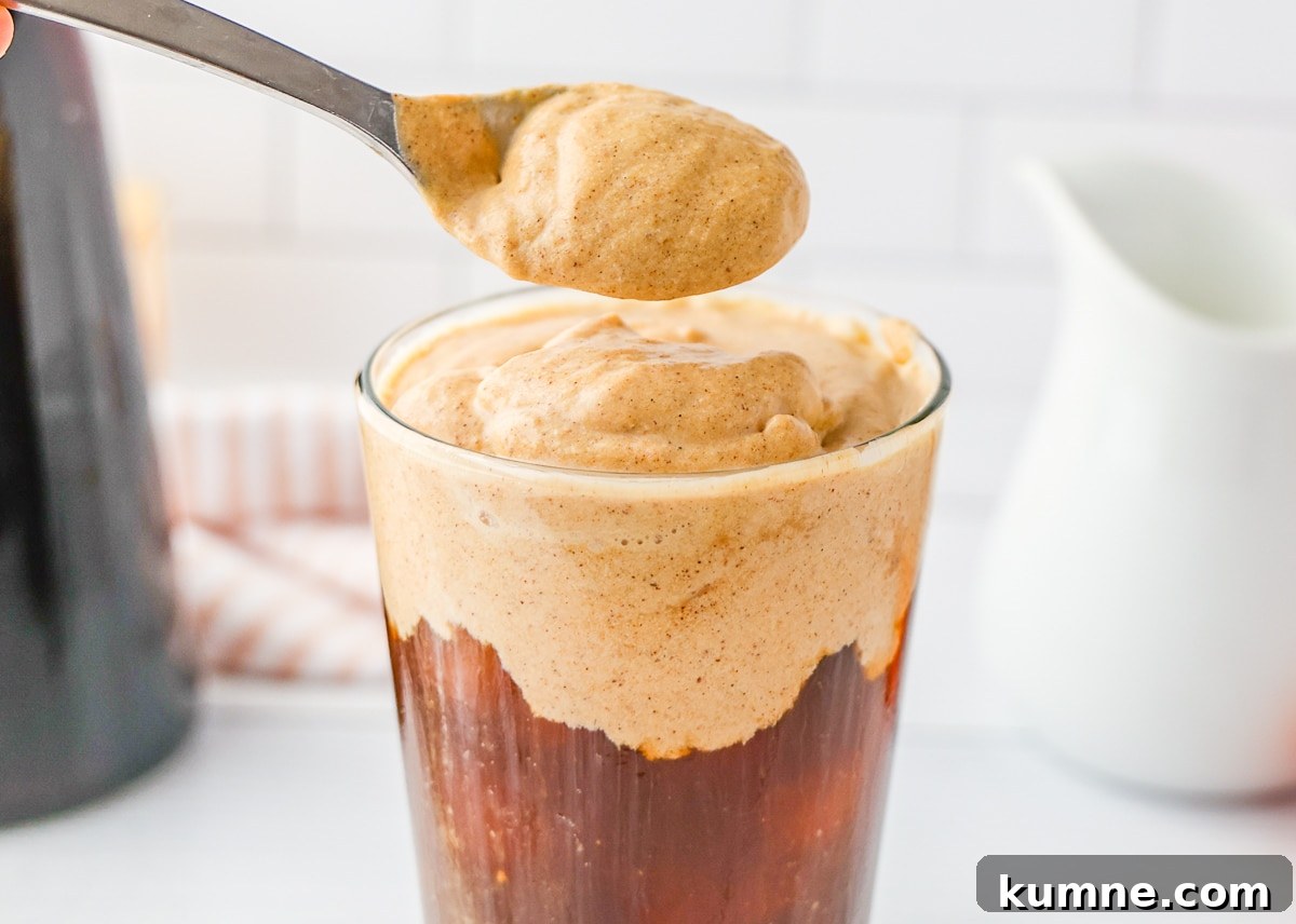 Spoon the foam over the iced cold brew