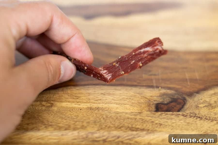 Brown Sugar Beef Jerky Recipe: Sweet-Glazed Homemade Jerky 6 Testing jerky by bending it to see if its finished