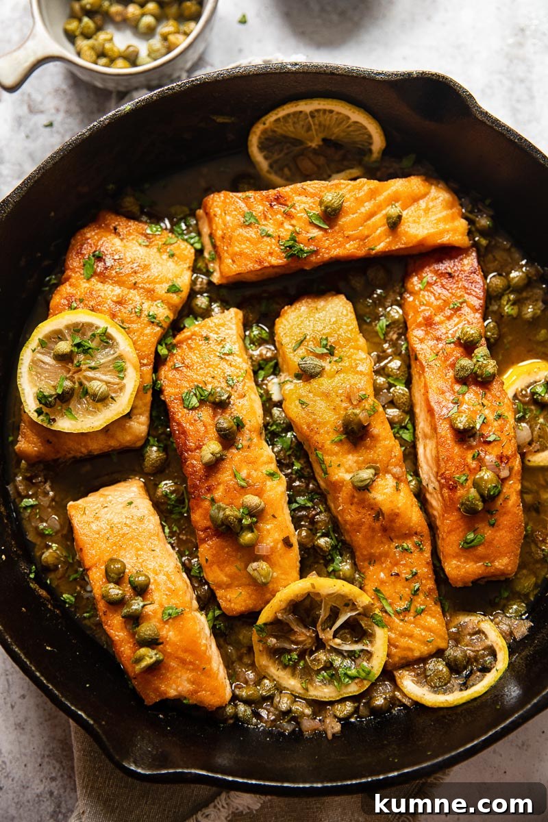Lemon Caper Salmon Piccata Recipe with Garlic Butter Sauce 6 top down view of pan seared salmon with piccata sauce
