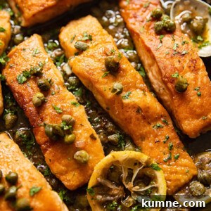 Lemon Caper Salmon Piccata Recipe with Garlic Butter Sauce 7 pan seared salmon topped with capers and lemon slices
