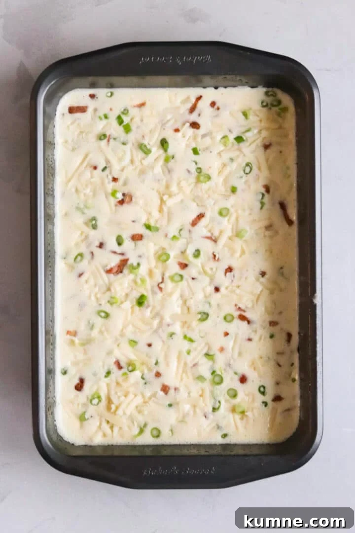 Cottage Cheese Frittata with Eggs and Herbs 7 Raw cottage cheese egg bake topped with shredded cheese, sliced green onions, and cooked and chopped turkey bacon