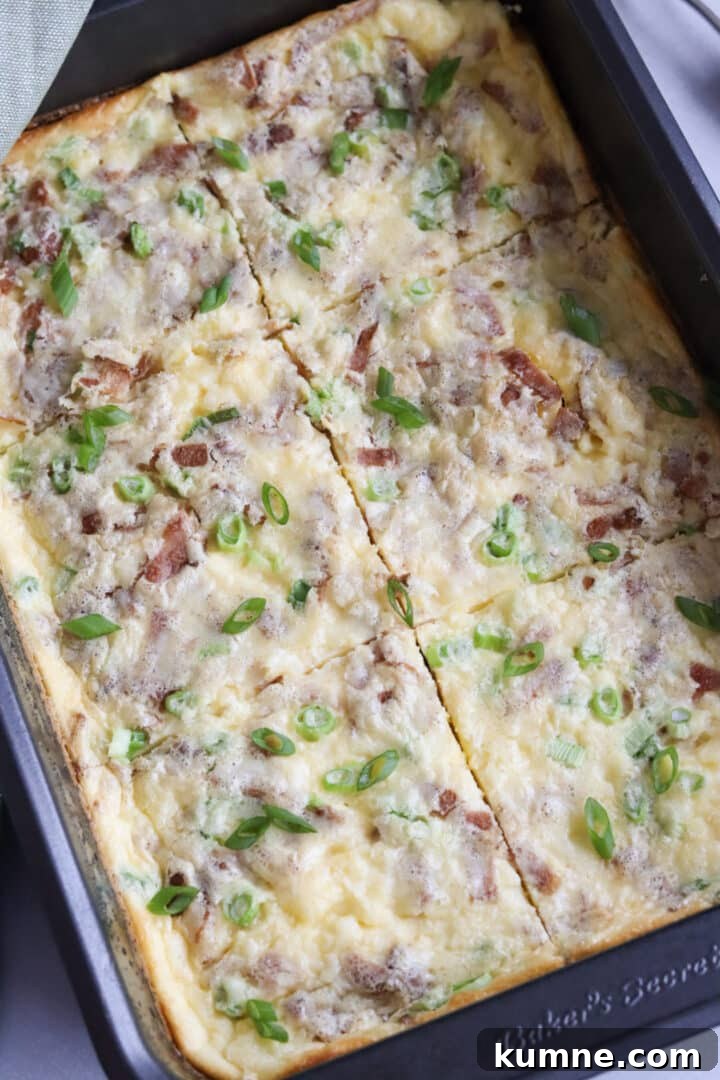 Cottage Cheese Frittata with Eggs and Herbs 8 Cottage cheese egg bake with green onions, bacon and cheese sliced in a large non-stick metal pan