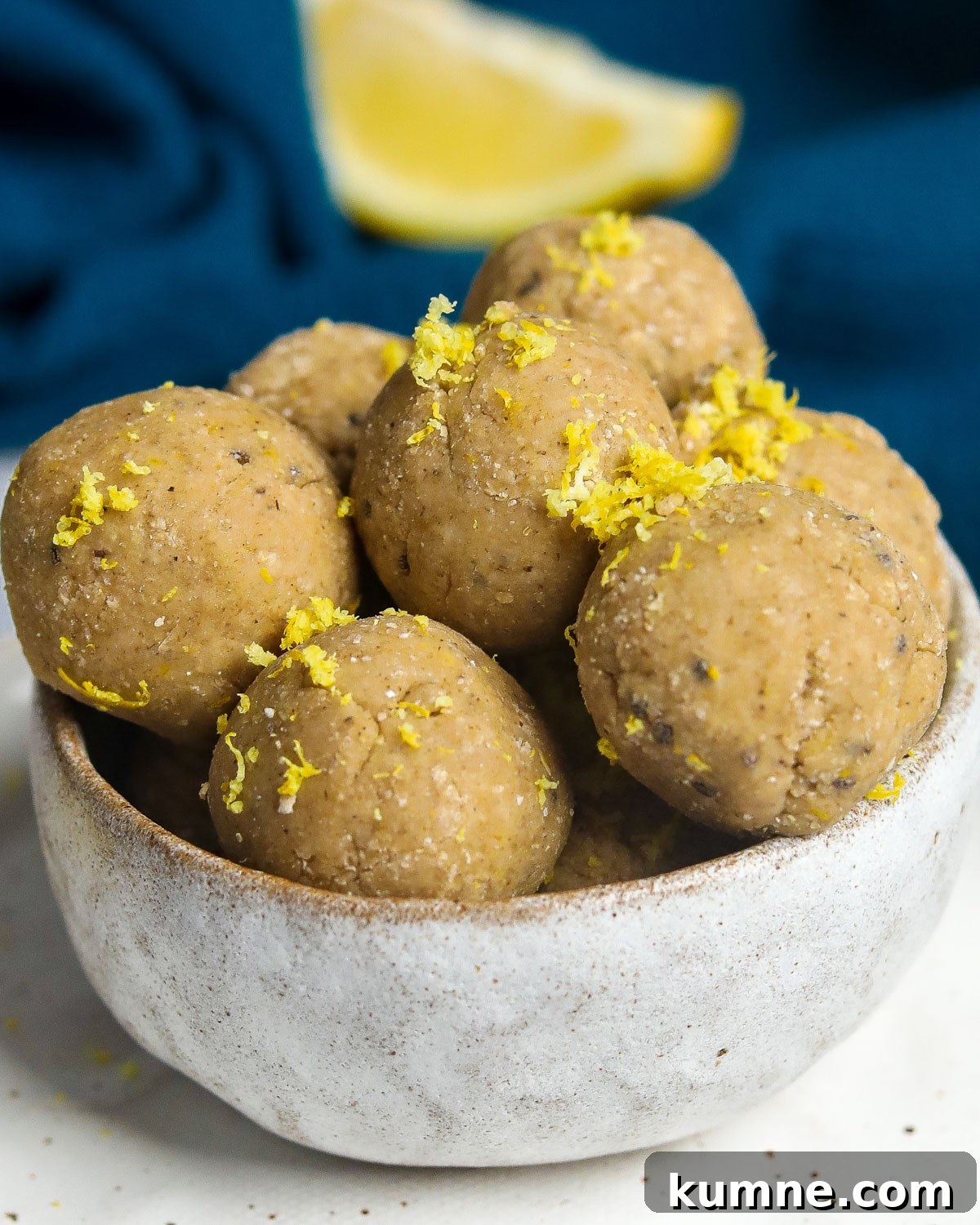 bowl of protein balls with lemon zest